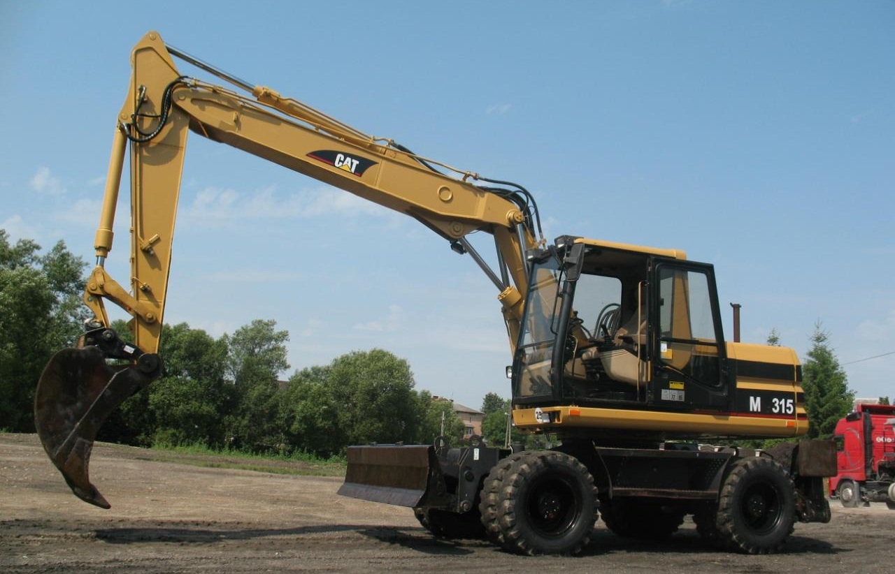 Экскаватор аренда москва и московская. Экскаватор Caterpillar m315d. Аренда экскаватора Москва. Аренда экскаватора Москва и Московская область. Cat 315 / d and c Ghana.